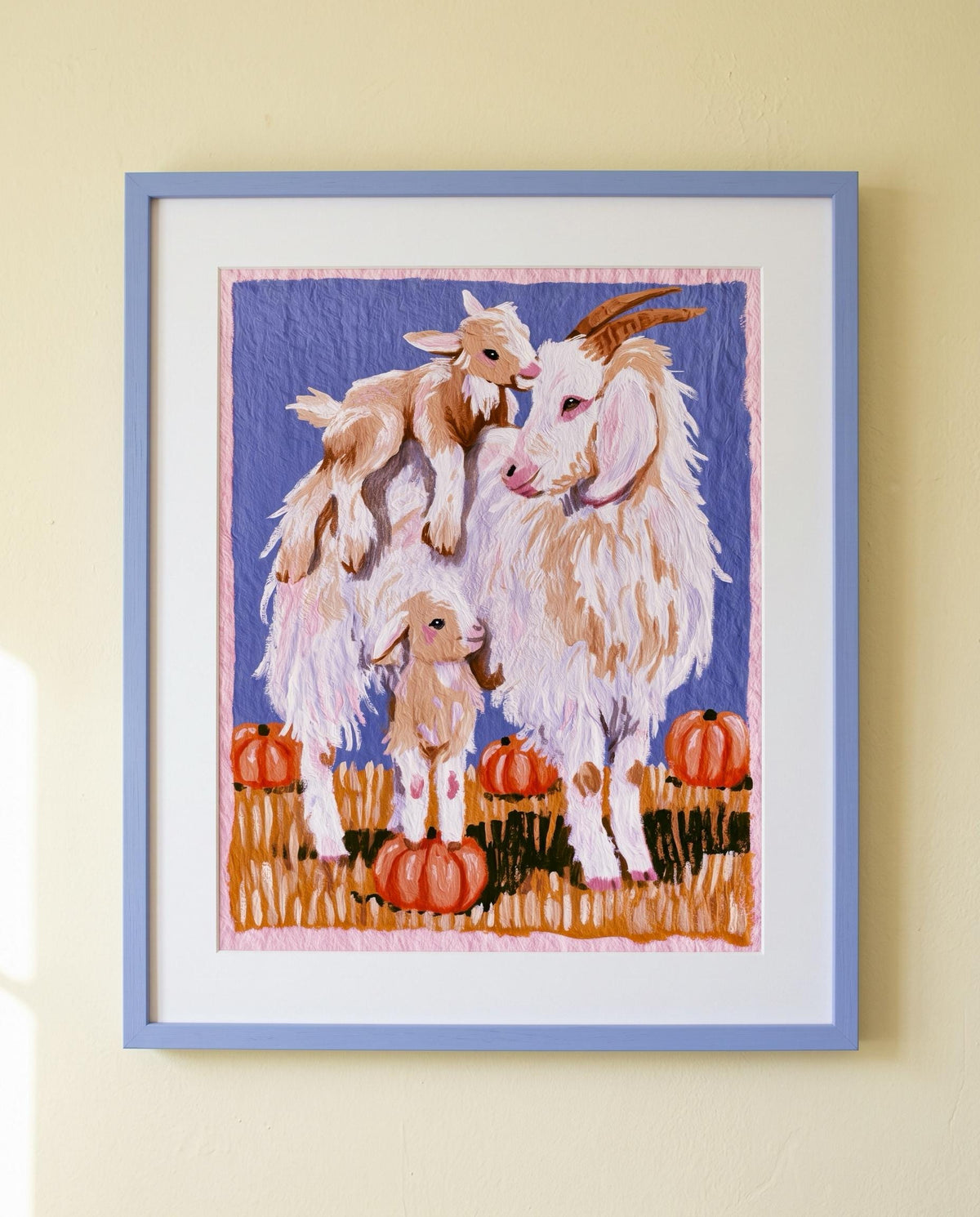 Little Herd: painting of a mama goat and two kids among pumpkins